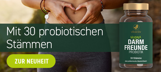 Eine Frau formt mit den Händen ein Herz vor dem Bauch. Text: Probiotikum für den Darm mit 30 probiotischen Bakterienstämmen. Jetzt kaufen!